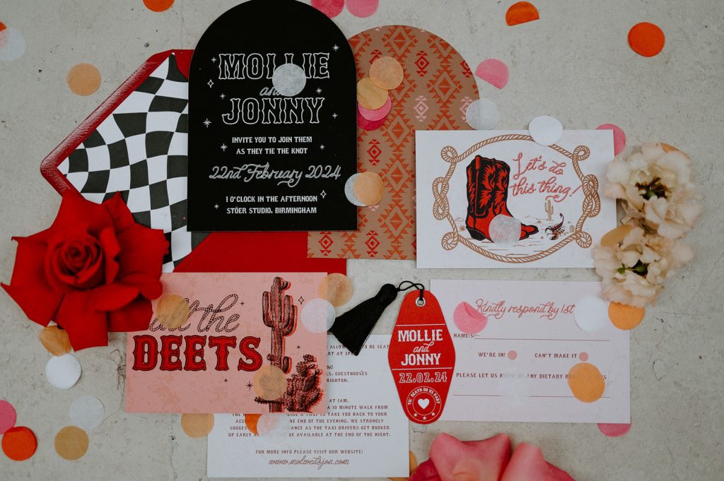 pink and red Texas cowboy inspired wedding stationery.