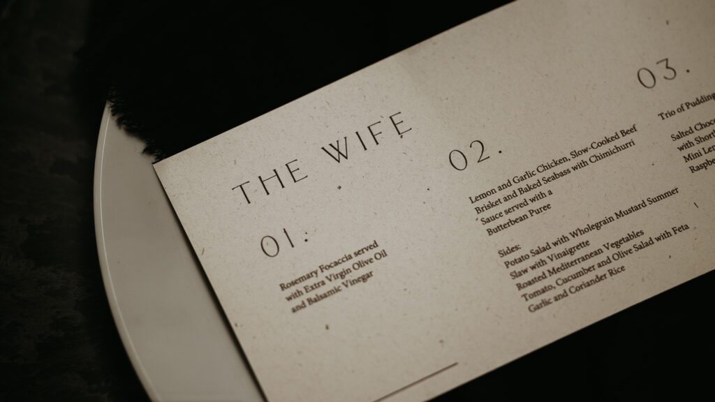 Detail photo of the brides wedding stationery at The Willow Marsh Farm.