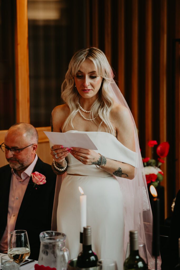 bride gives a speech at her wedding in Manchester at Ducie Street Warehouse.