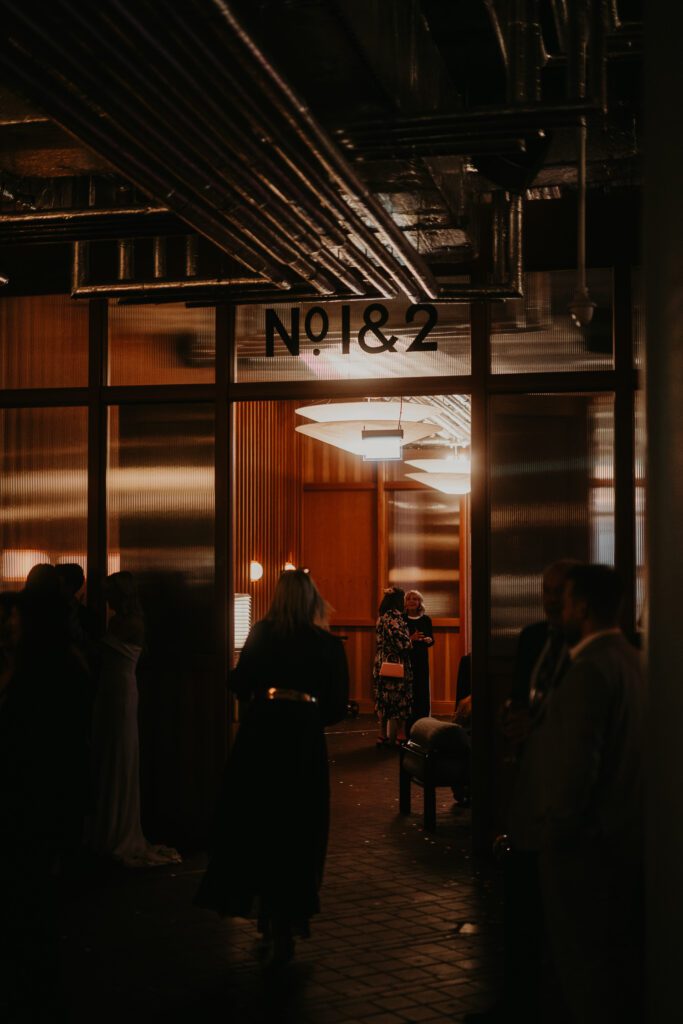 Guests at a wedding in Manchester at Ducie Street Warehouse.