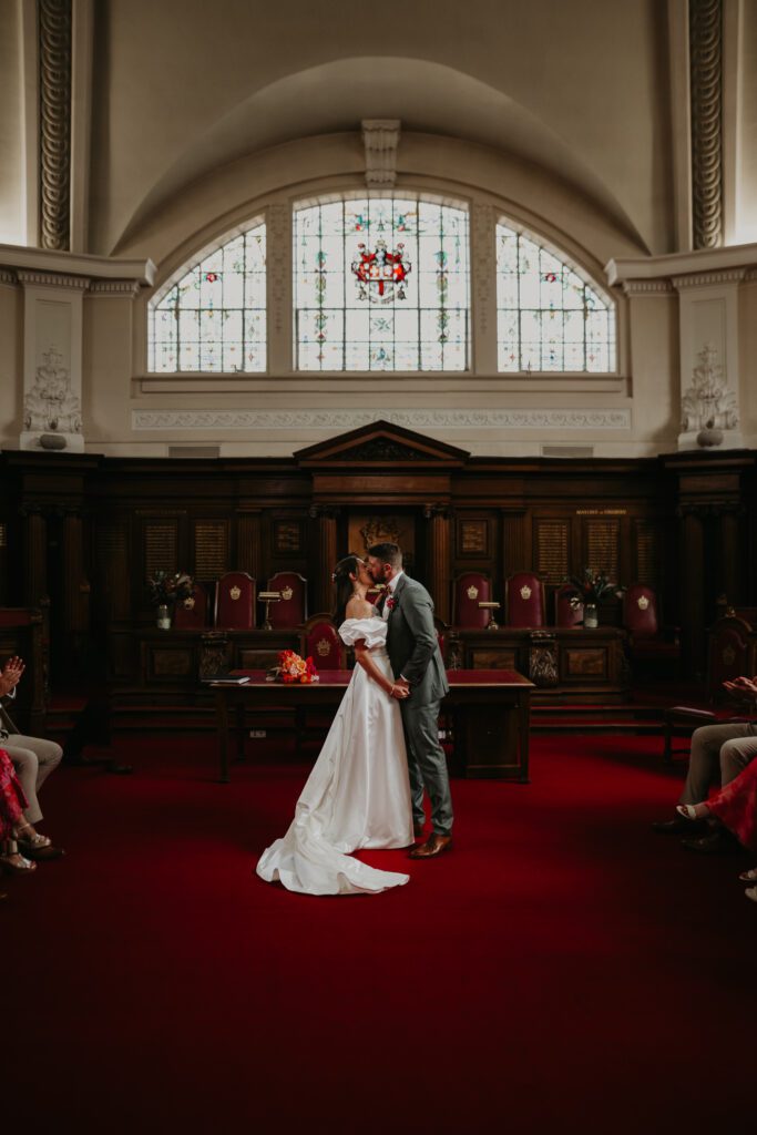 Bride and Grooms first kiss at Islington Town Hall.