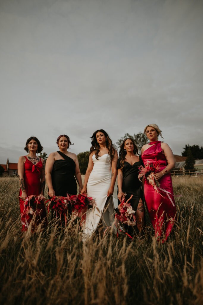 Bride and her bridesmaids pose for wedding party photos at a Newcastle wedding.
