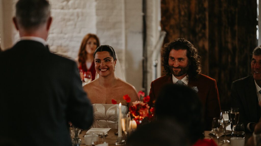 Bride reacts to her father's speech at her wedding at 100 Barrington.
