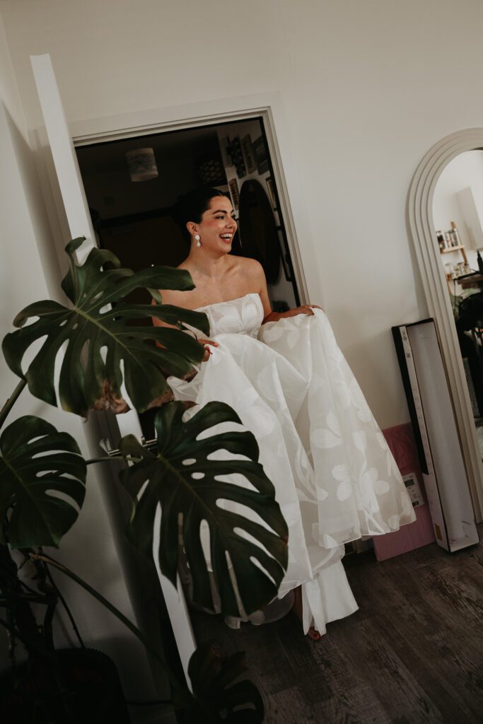A bride does a first look with her bridesmaids.