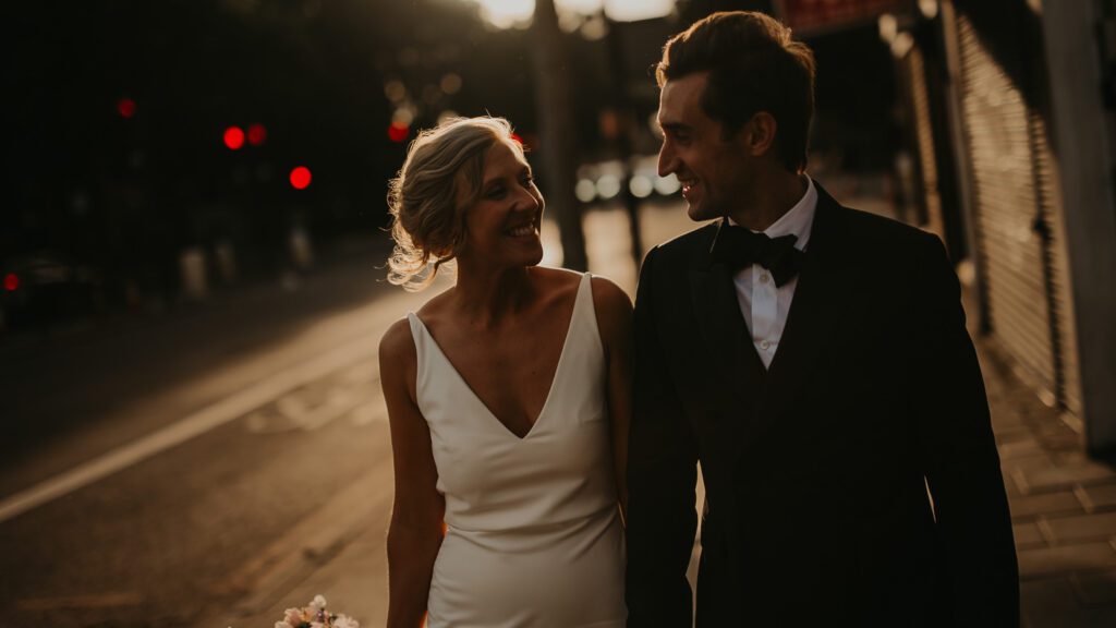Bride and groom wedding photos at golden hour in London.