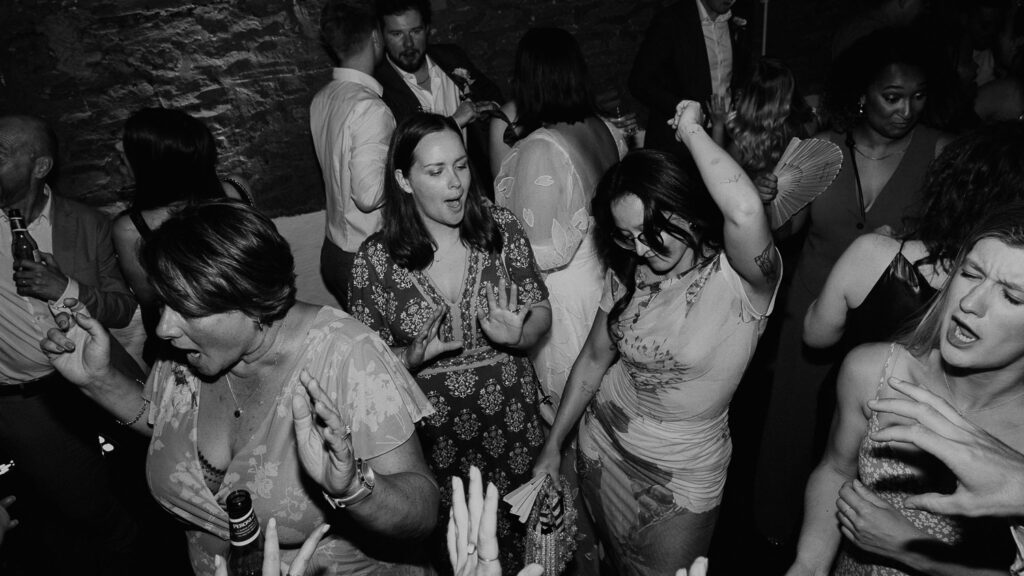 Wedding guests party on the dance floor at The Paintworks in Bristol. 