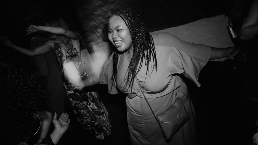 Wedding guests party on the dance floor at The Paintworks in Bristol. 