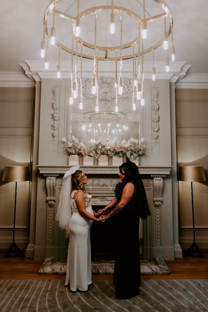 Two brides say their vows at the old Marylebone Town Hall in London.