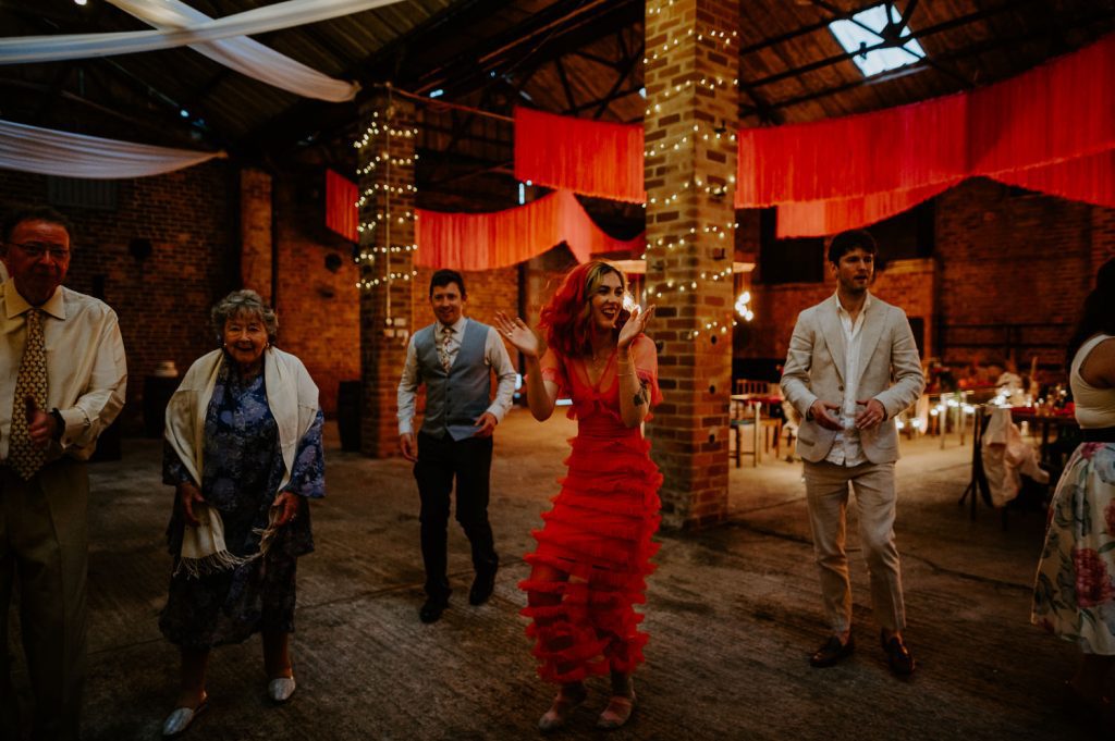 Wedding guests dance on the dance floor at White Syke Fields.