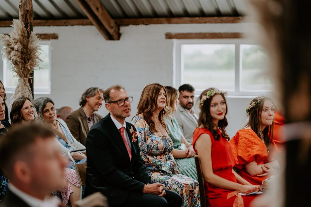 Guests look on as a bride and groom are married at White Syke Fields.