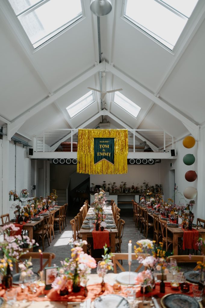 A stylishly colourful wedding breakfast set up at Five Four Studios.