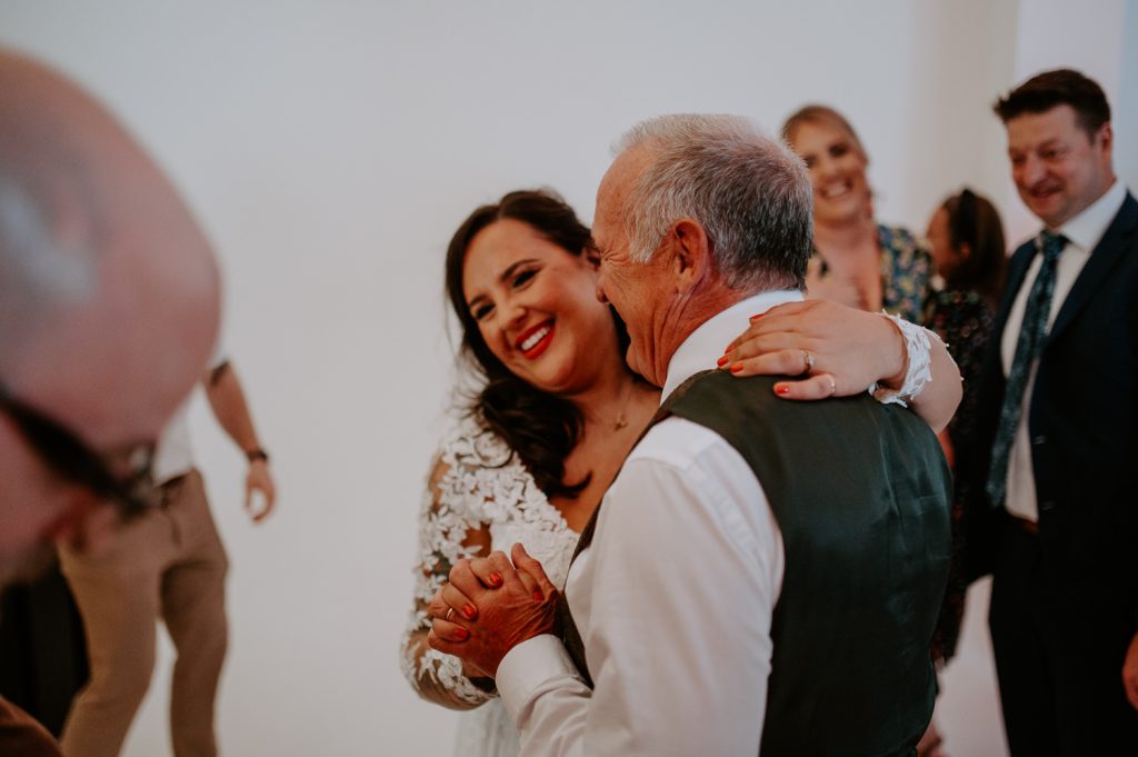 a bride dances with her dad at her stylishly colourful wedding at Five Four Studios